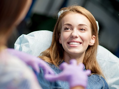 Smiling woman in dental chair