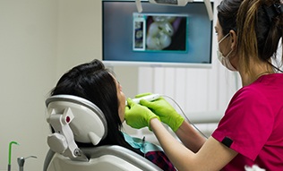 Dentist capturing intraoral photos