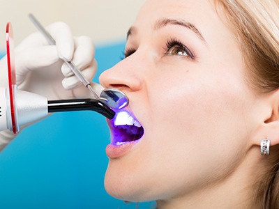 Woman receiving dental bonding