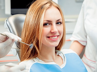 Smiling woman in dental chair