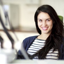 Smiling woman in dental chair