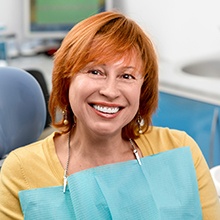 Smiling older woman in dental chair