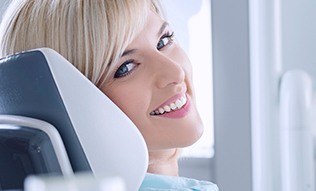 Smiling woman in dental chair